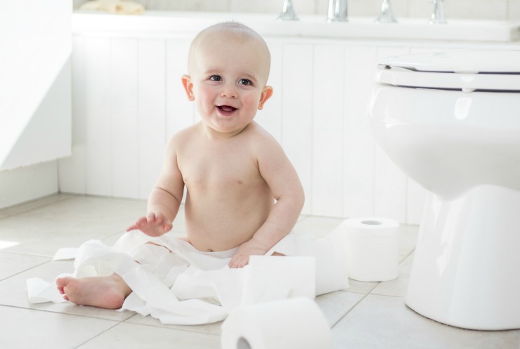 Baby with toilet paper